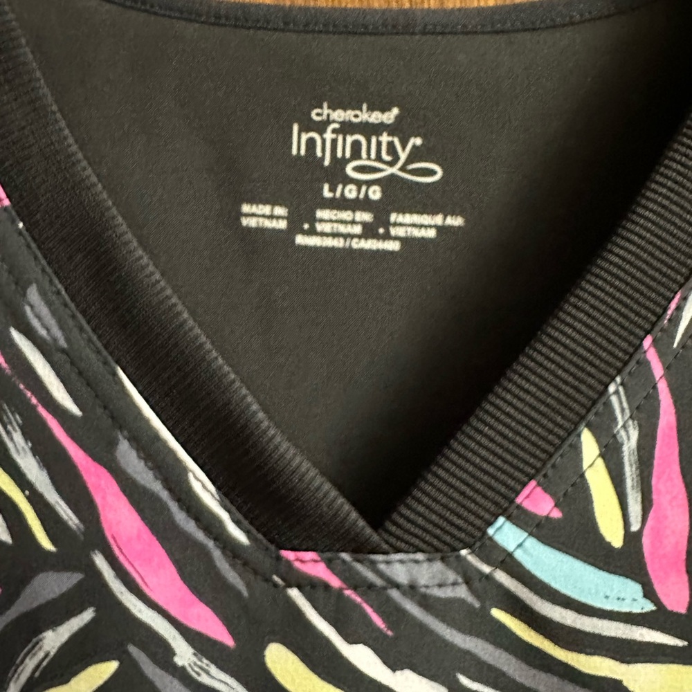 Black With Multi Colored Pattern Scrub Top - image 3